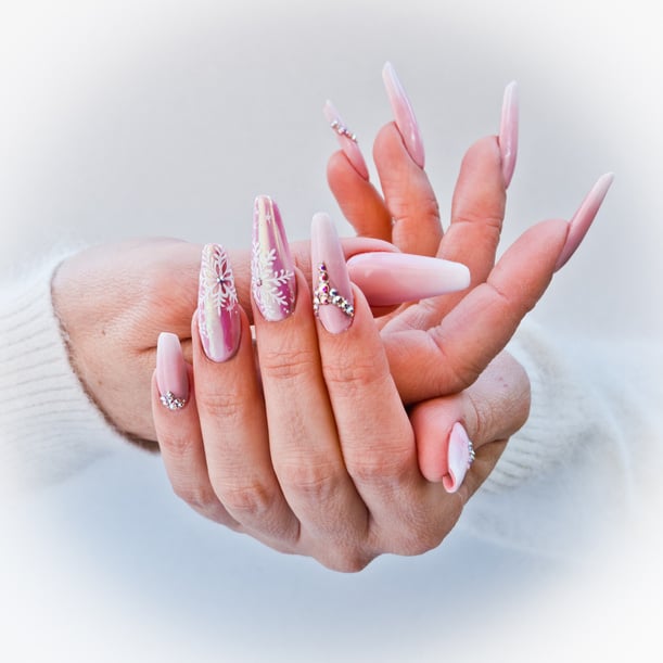 nails with pink Christmas decorations